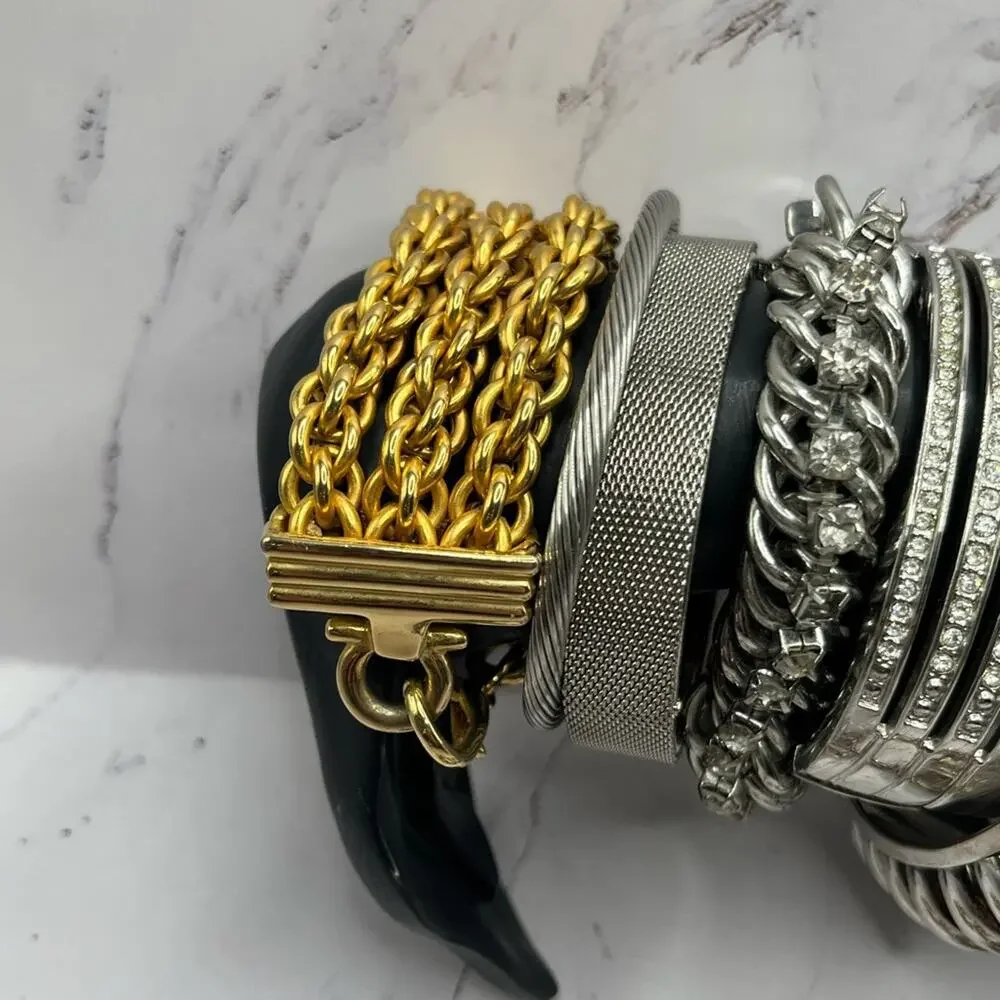 Set of 11 silver and gold tone bracelets